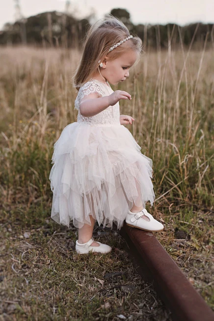 A cute baby wearing a sustainable and fashionable Tiny-Trends outfit, blending comfort with style.
